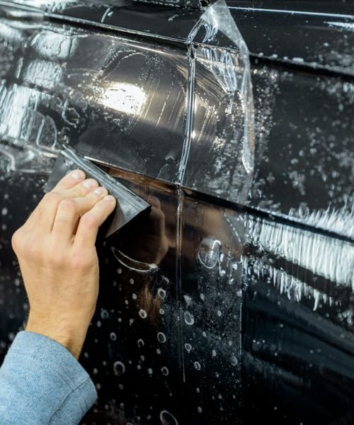 Filming car body at the vehicle service