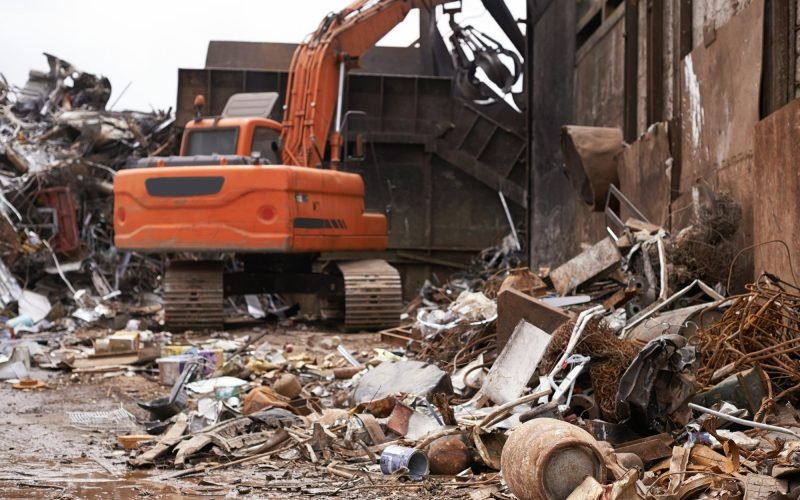 Sorting through the junk. Cropped shot of a pile of equipment and scrap metal.